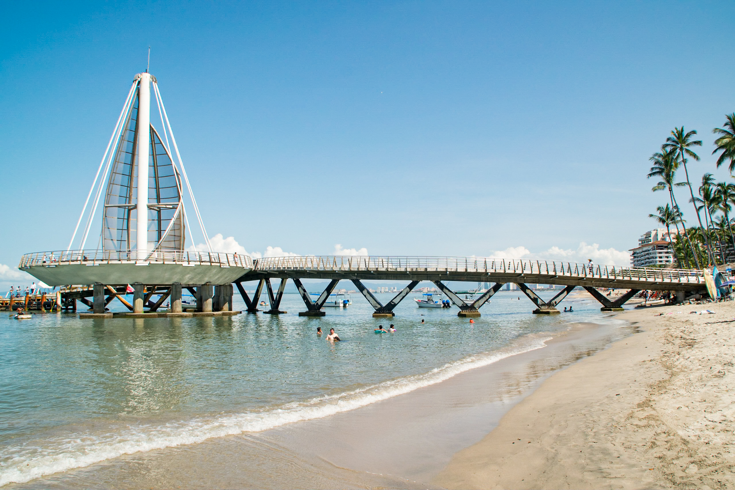 Modern pier with sail-like design in a Mexican beach town—perfect for MICE events seeking iconic venues and scenic backdrops.